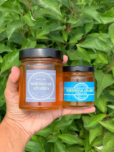 Photo of Northstar Apiaries' 13.5 ounce and 6 ounce honey jars